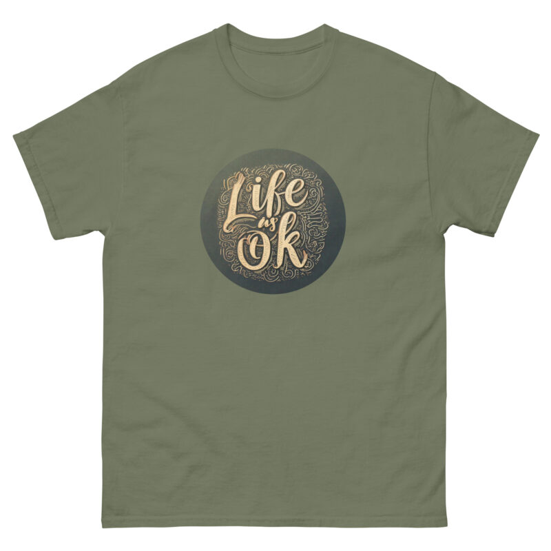 The LIF IS OK - Oval by Evolve Shirts is an olive green T-shirt featuring the phrase "Life is OK" in a stylish, decorative font elegantly centered within a dark circle.