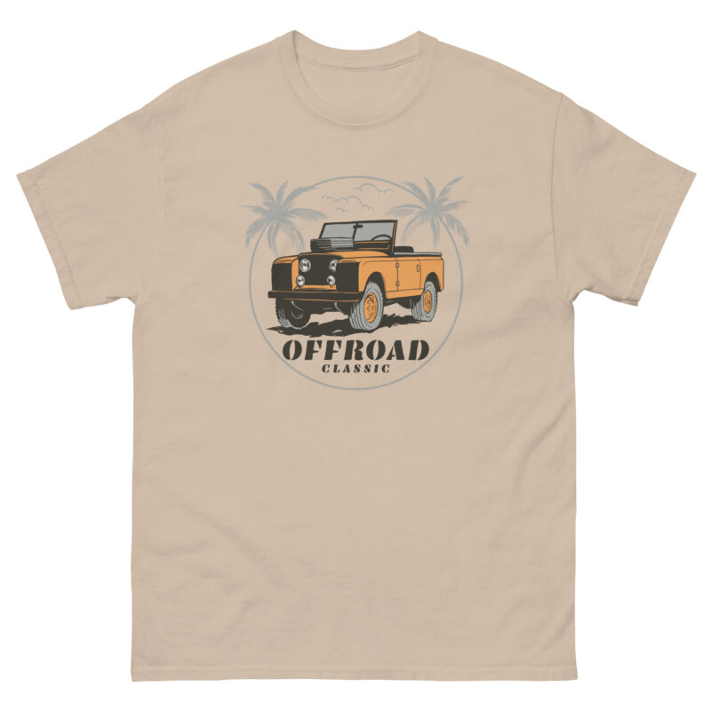 The Off Road Classic from Evolve Shirts is a beige t-shirt featuring an illustration of an orange classic Landrover set against palm trees, with bold "OFFROAD CLASSIC" lettering beneath it.