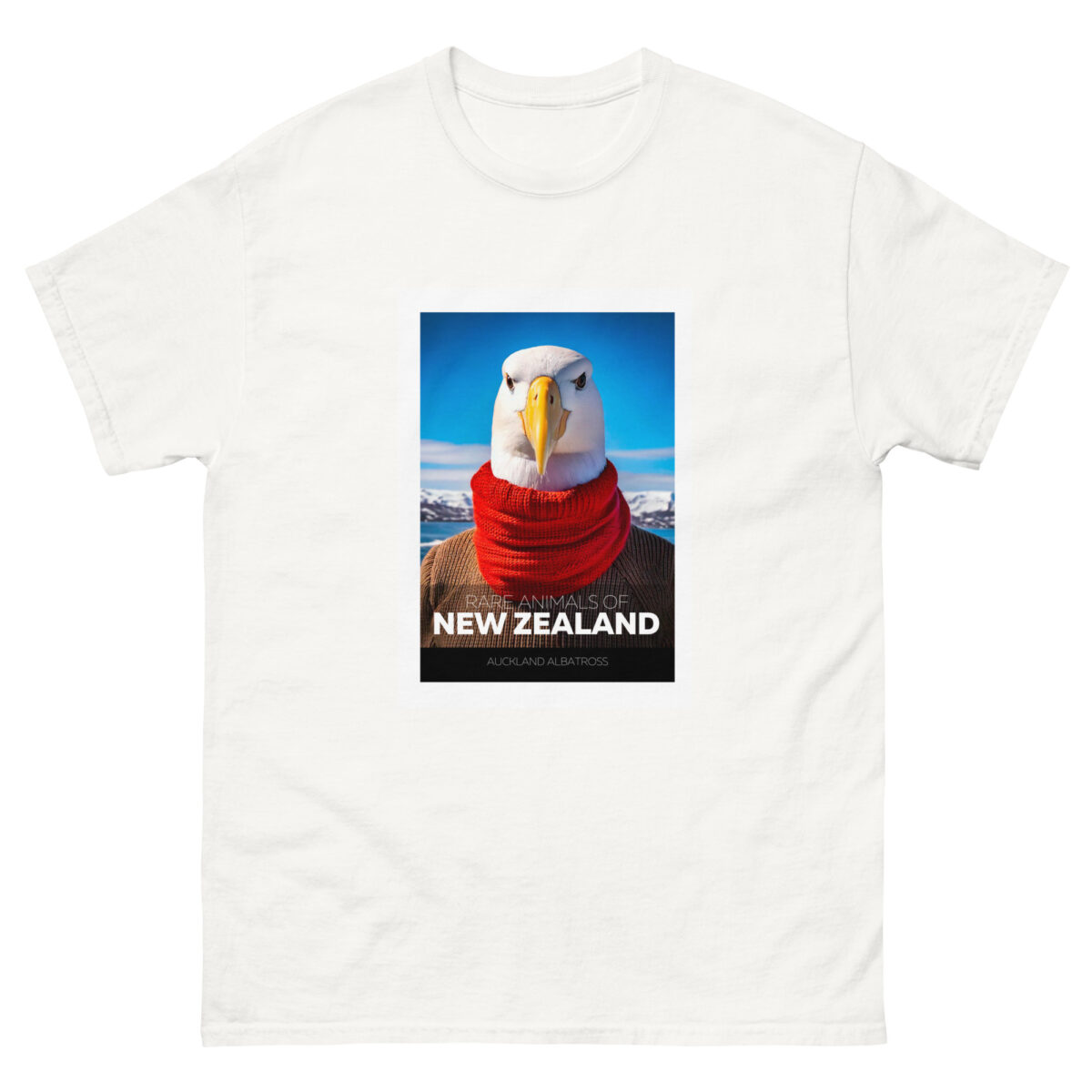 A white T-shirt showcasing the Rare Animals - Auckland Albatross design, featuring an albatross with a serious expression, adorned with a red scarf against a blue sky. The text reads: Rare Animals of New Zealand - Auckland Albatross.